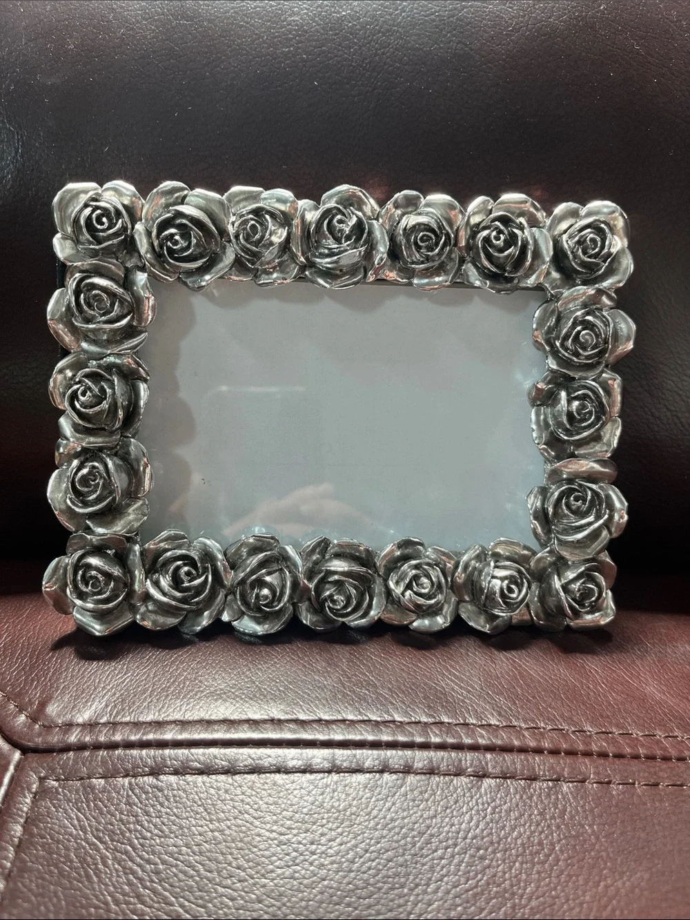 Rose adorned 6 1/2 x 4 1/2 metal frame